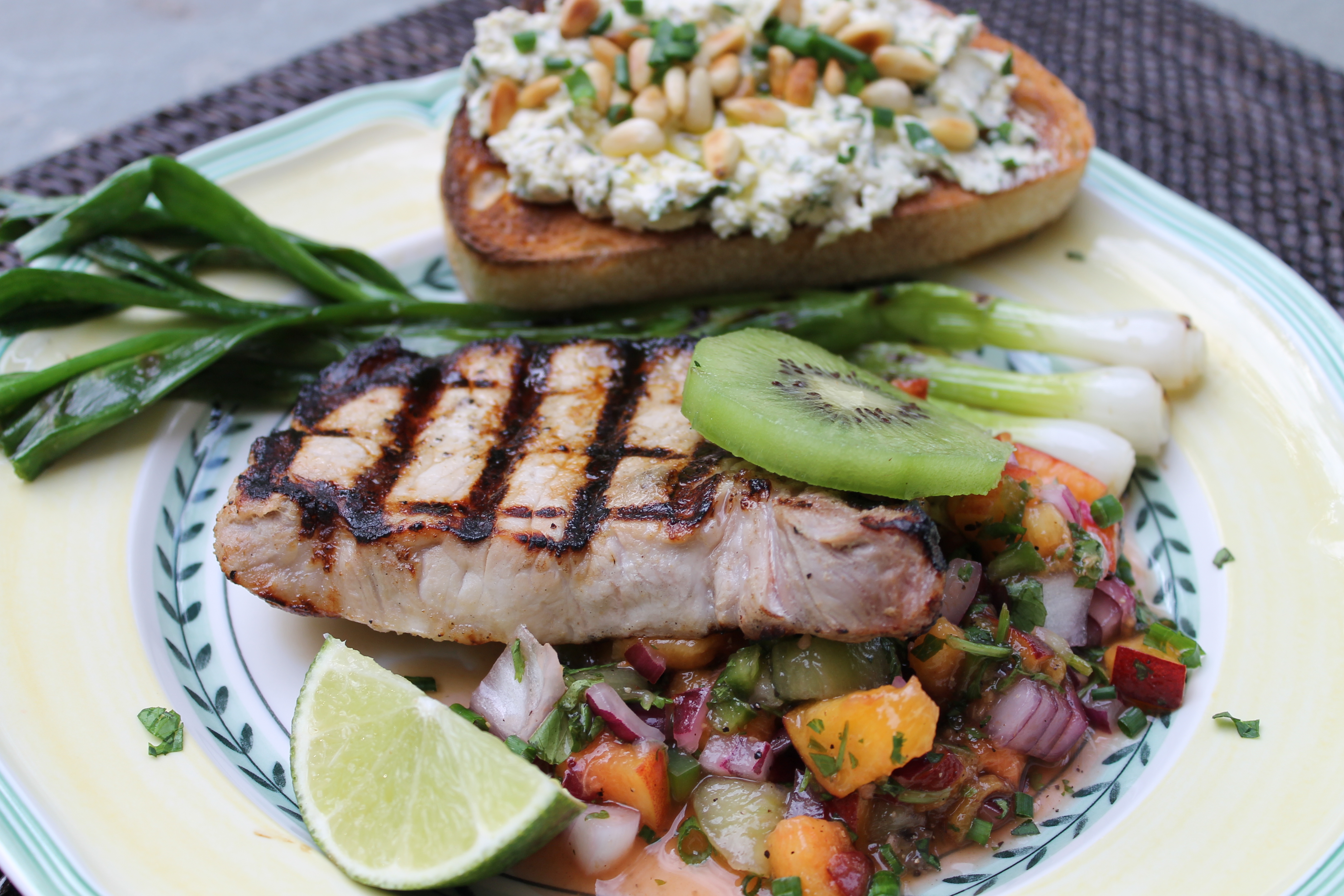 Grilled Pork Chop with Peach and Kiwi Salsa