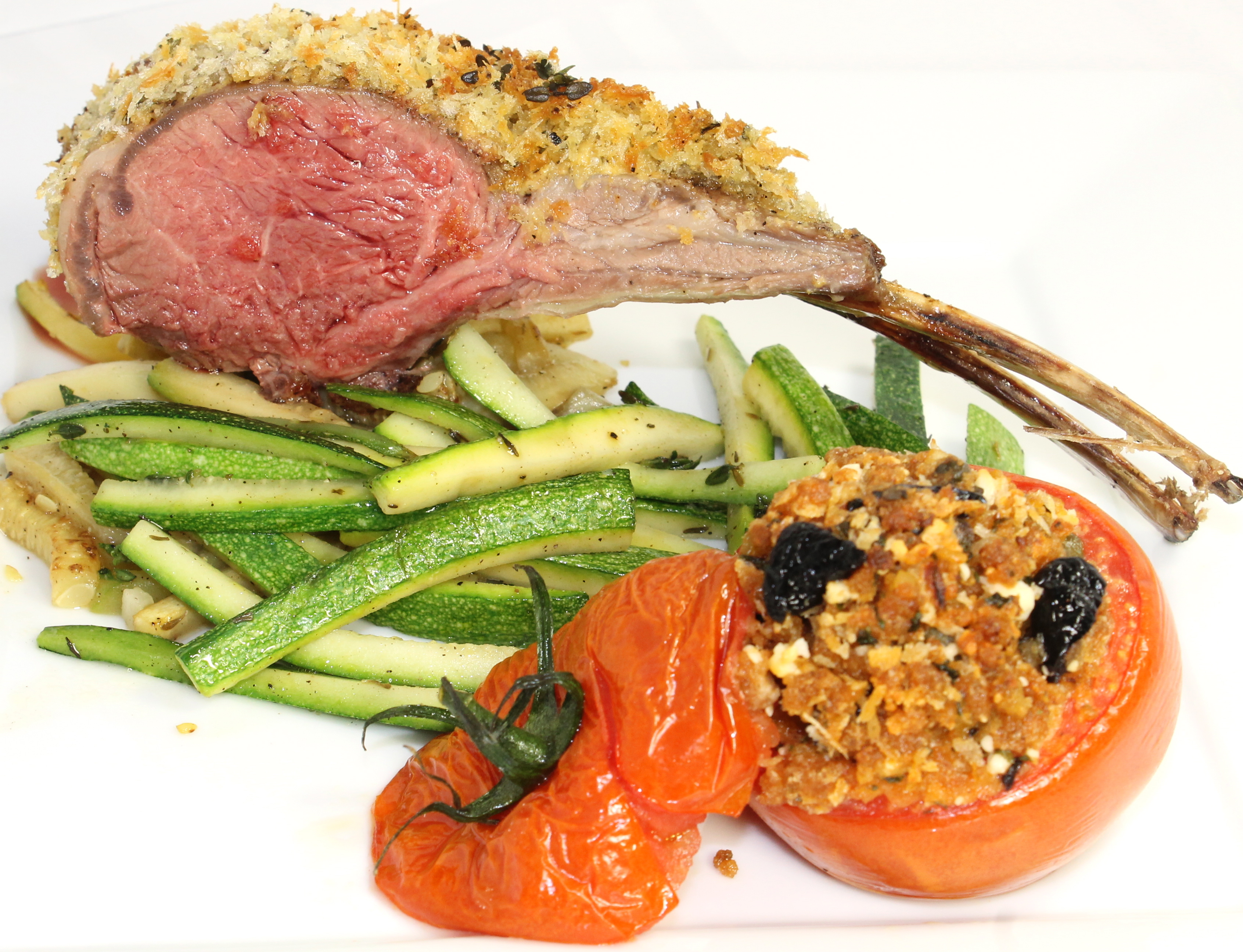 provencal stuffed tomato with lamb chops