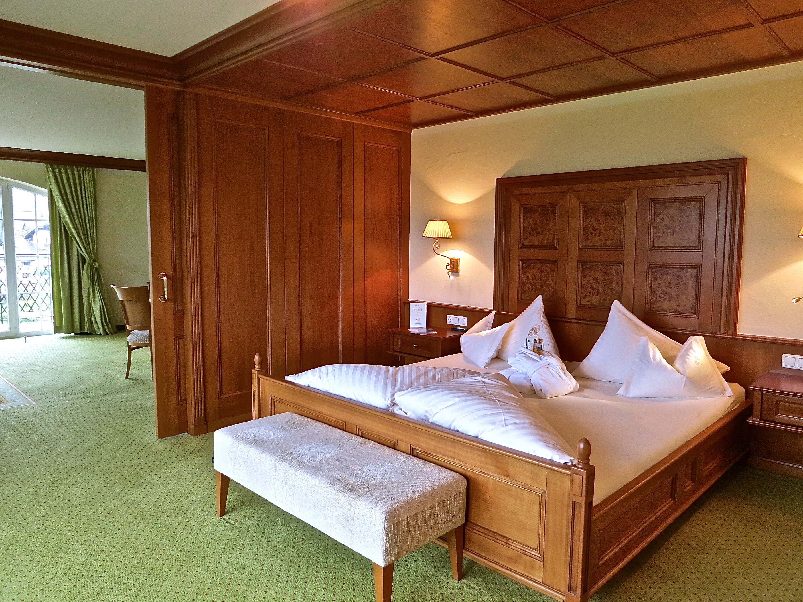 the bedroom-of-one-of-the-suites-at-hotel-post-lermoos