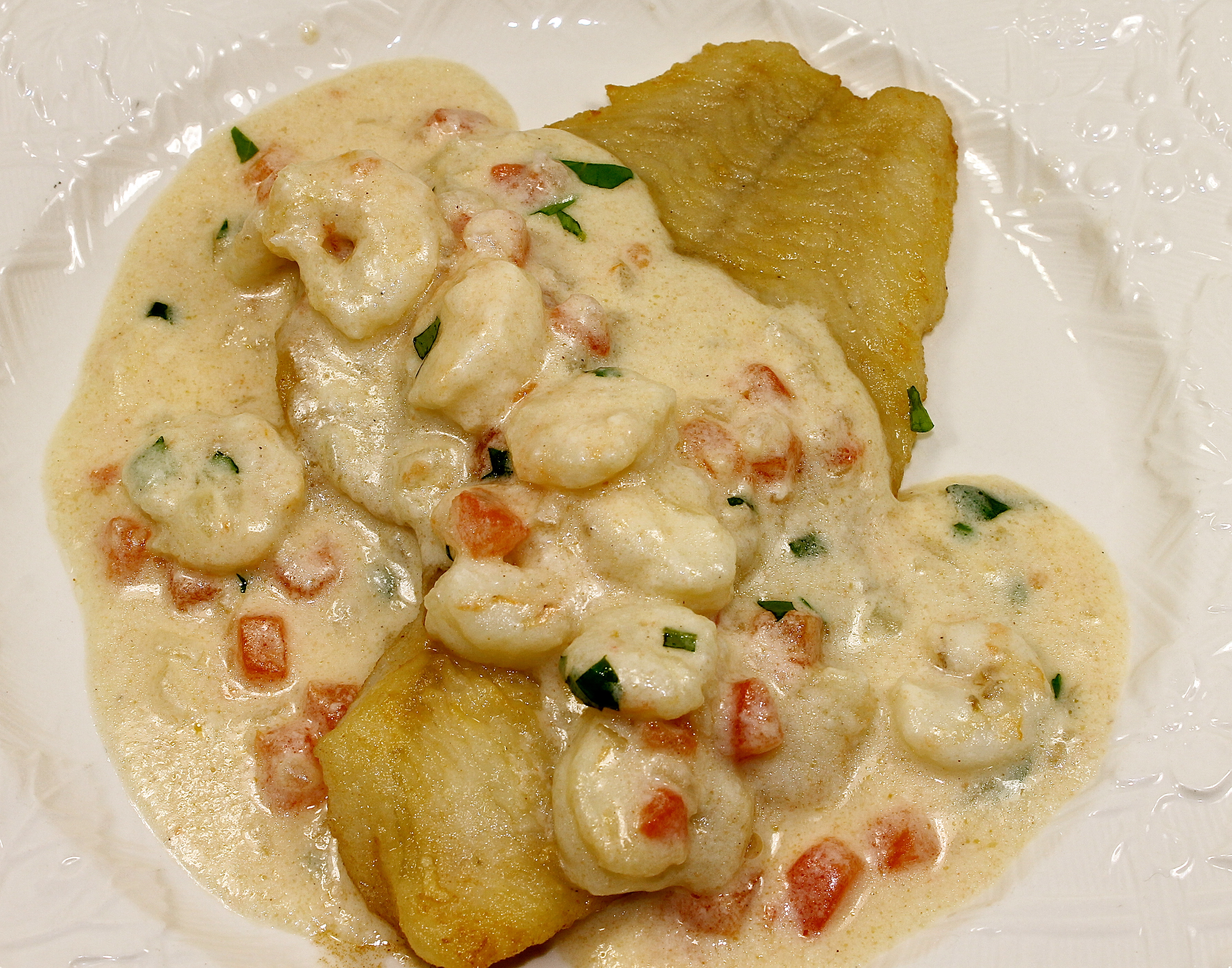 Sautéed Flounder Topped With A Shrimp Cream Sauce