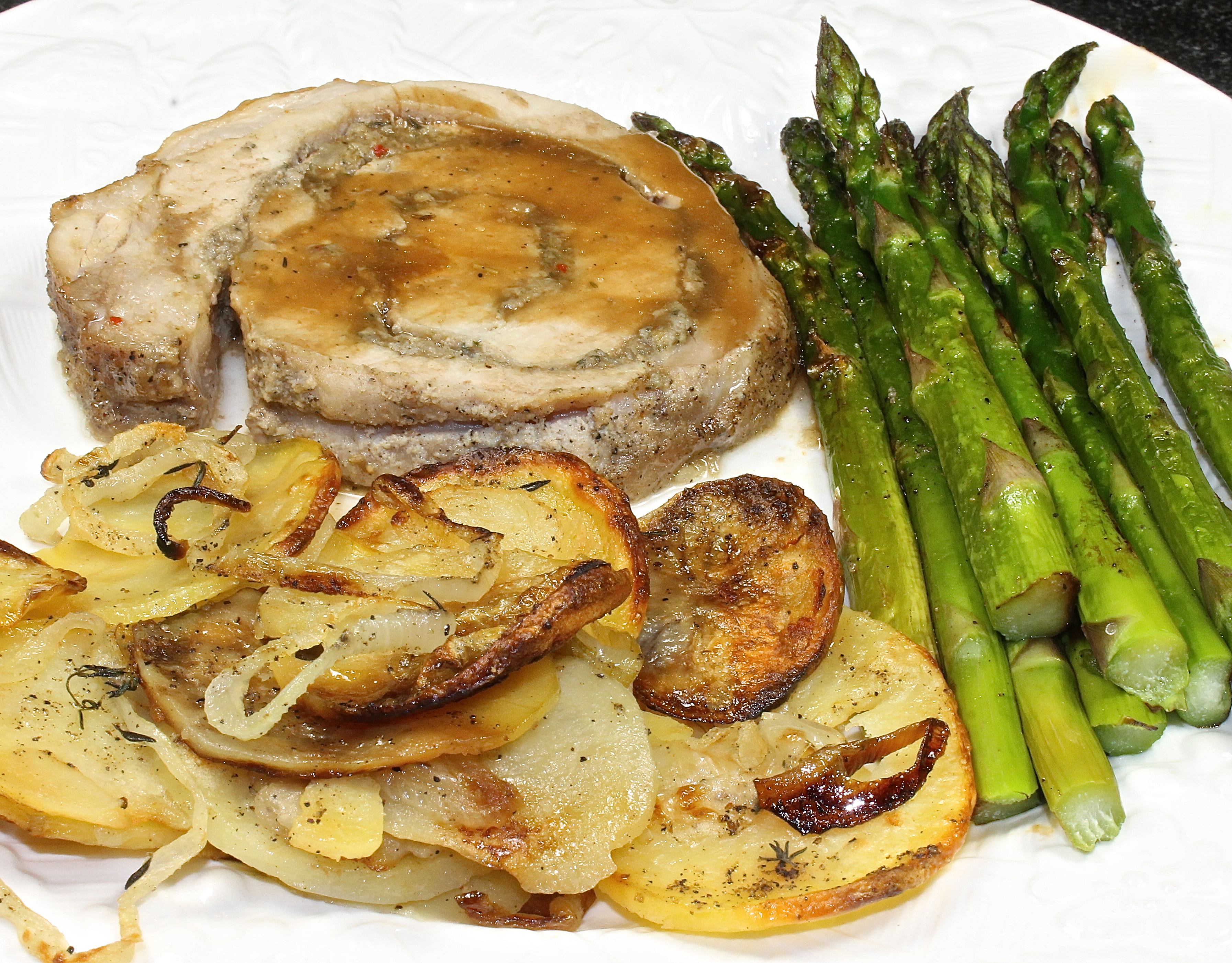 Porchetta With Roasted Potatoes and Onions and Roasted Asparagus 