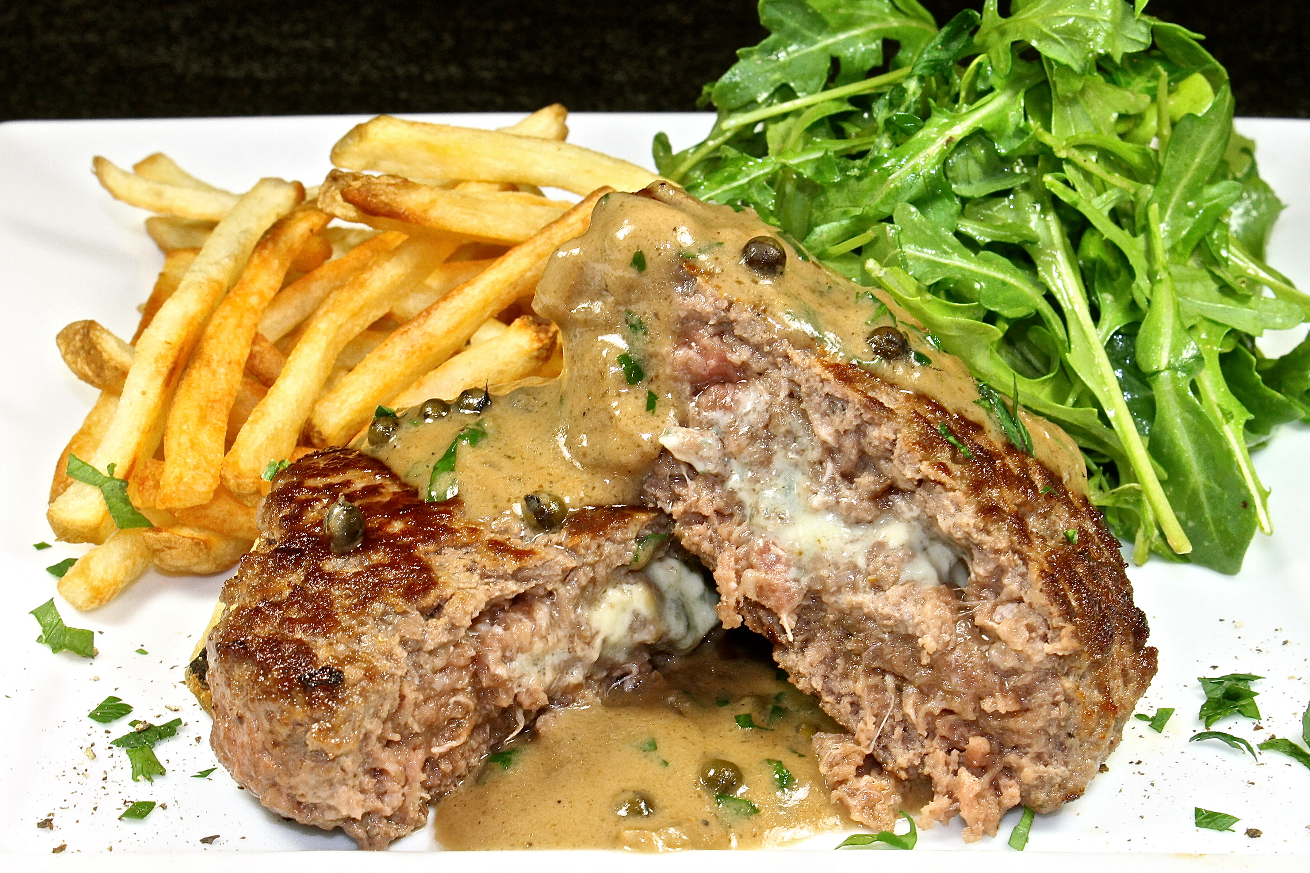 Blue Cheese Stuffed Burger With A Port And Green Peppercorn Sauce