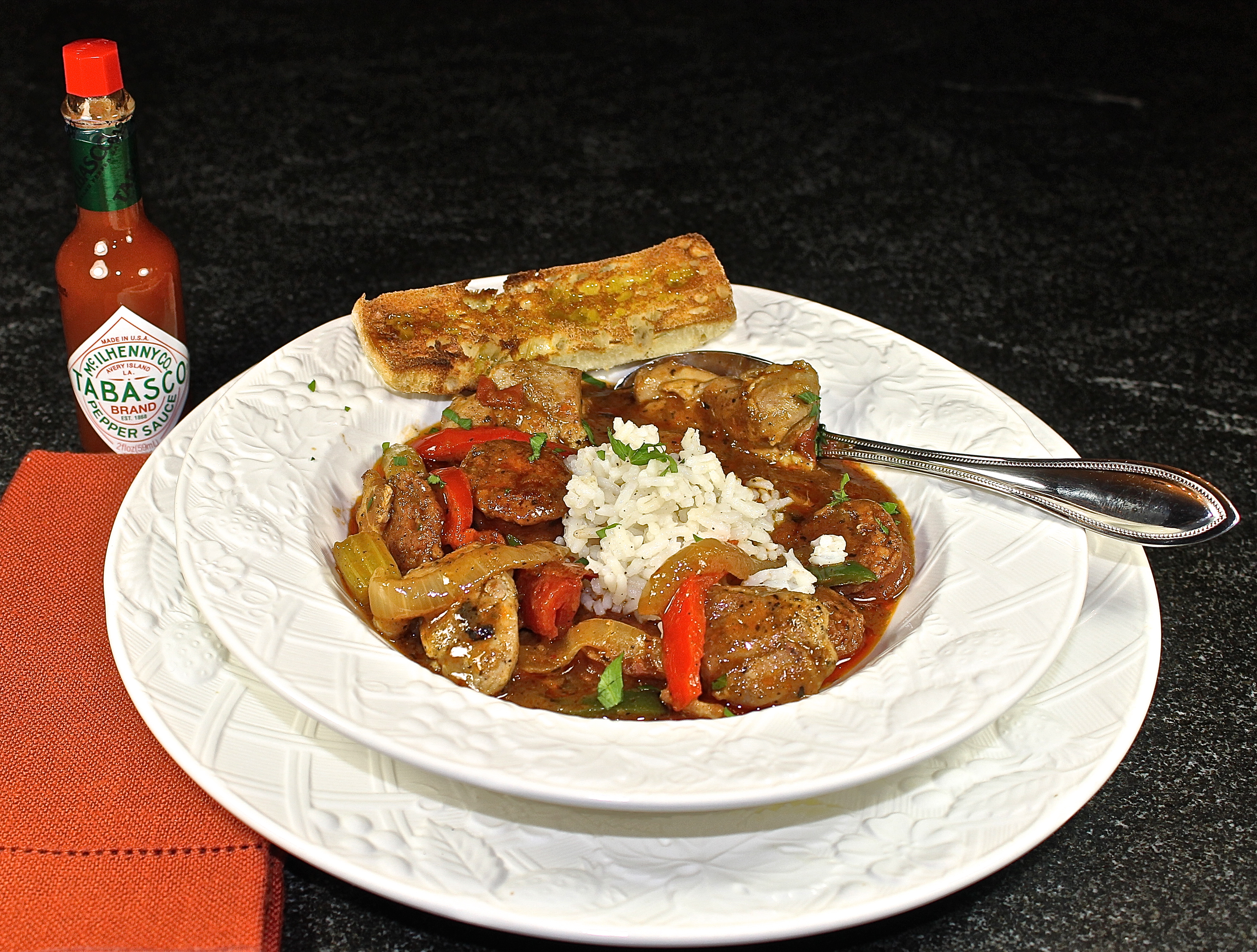 Gumbo Served With Rice And Tabasco On The Side