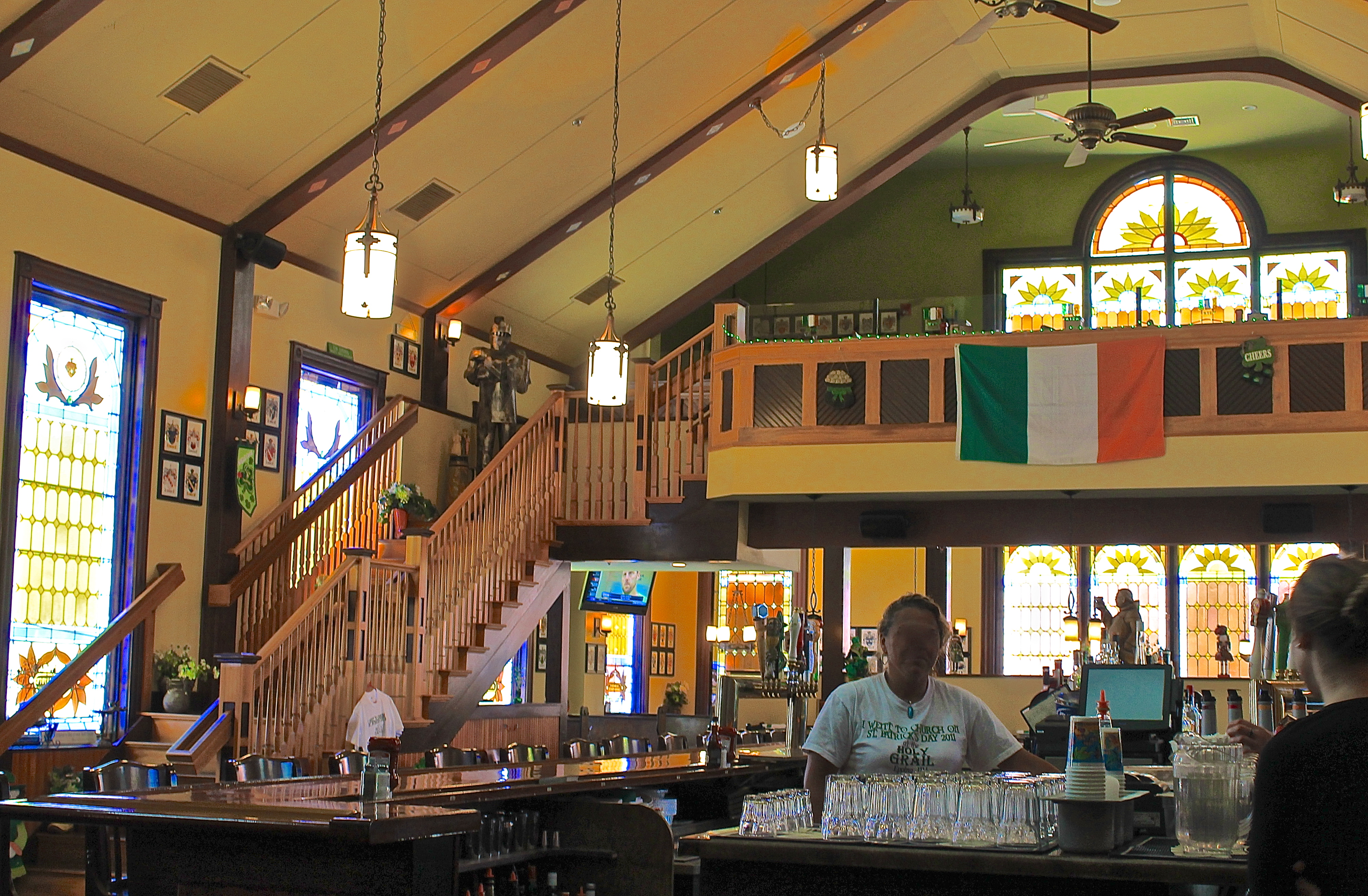 The Interior Of The Holy Grail With The Large Stained Glass Church Windows