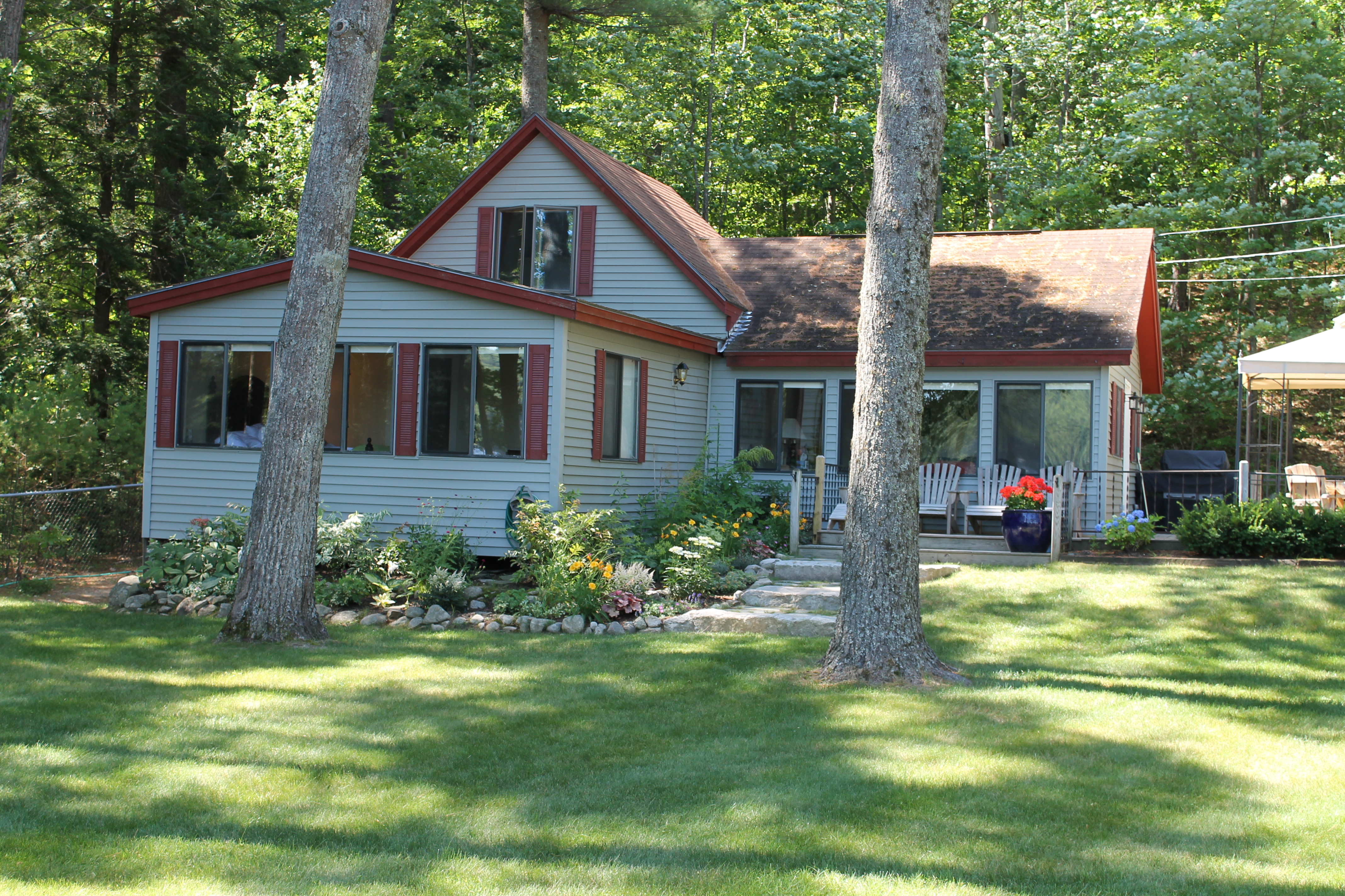 The Waterfront Lawn Of The Cottage Has Been Professionally Landscaped