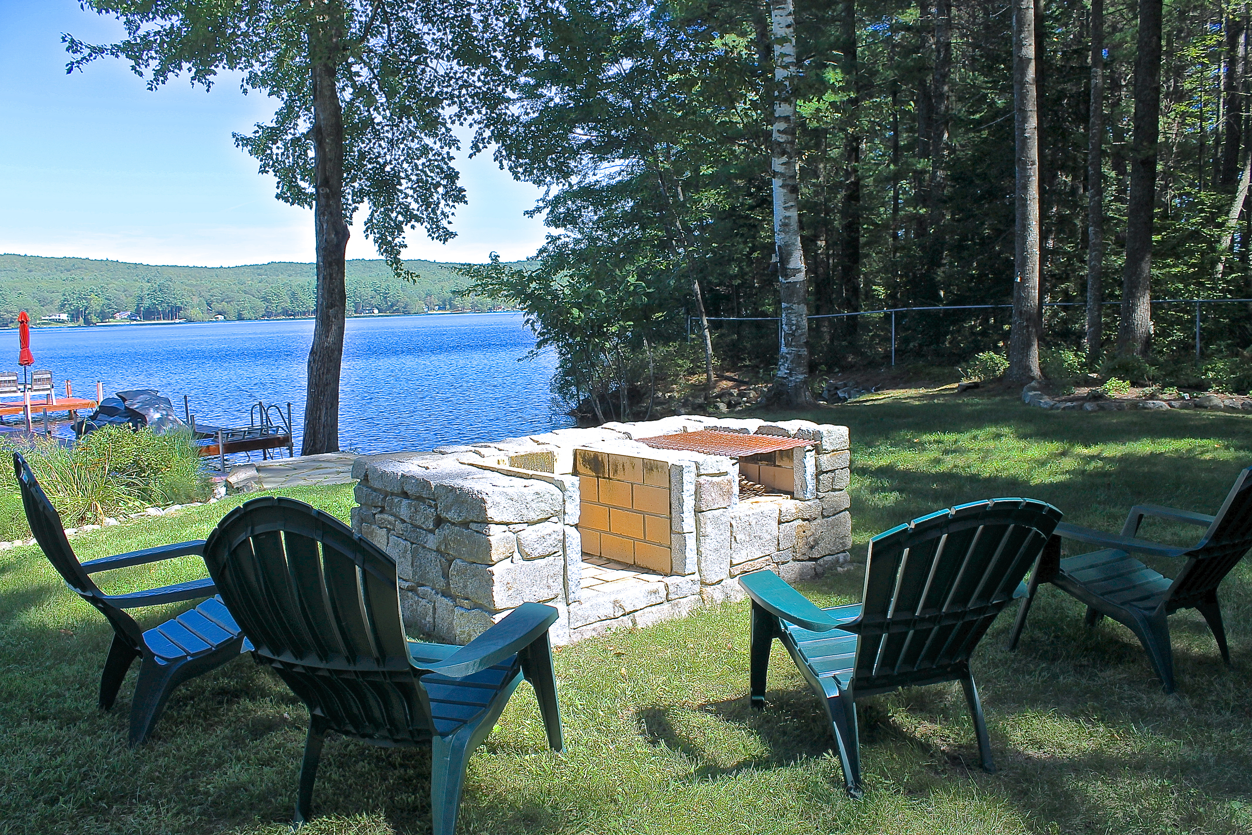 stone fire pir and bbq with lake view