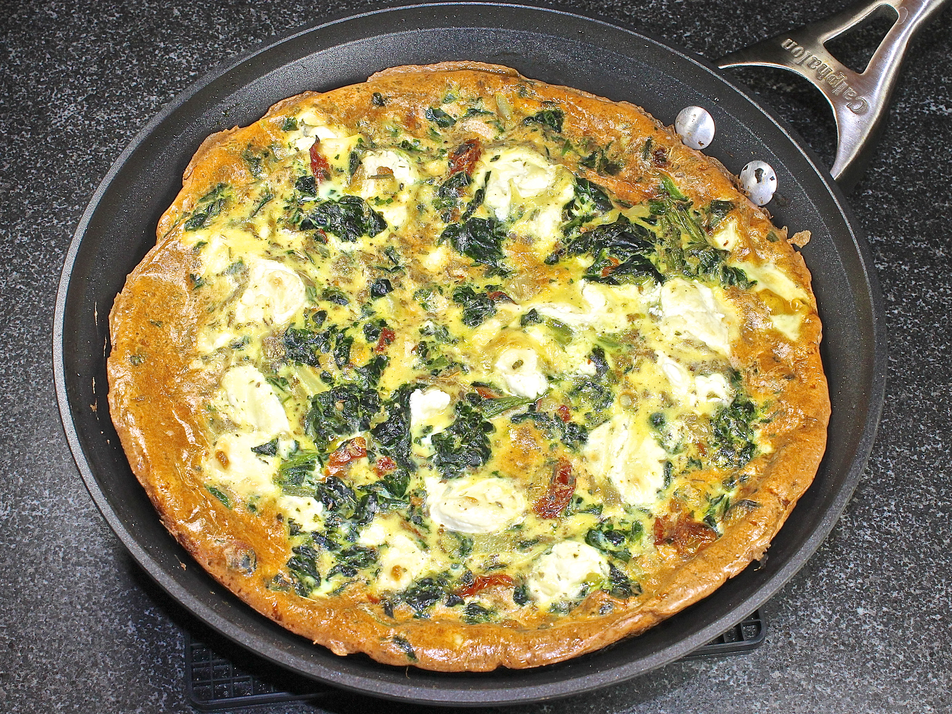 Spinach, Sun Dried Tomatoes and Goat Cheese Frittata Hot From The Oven