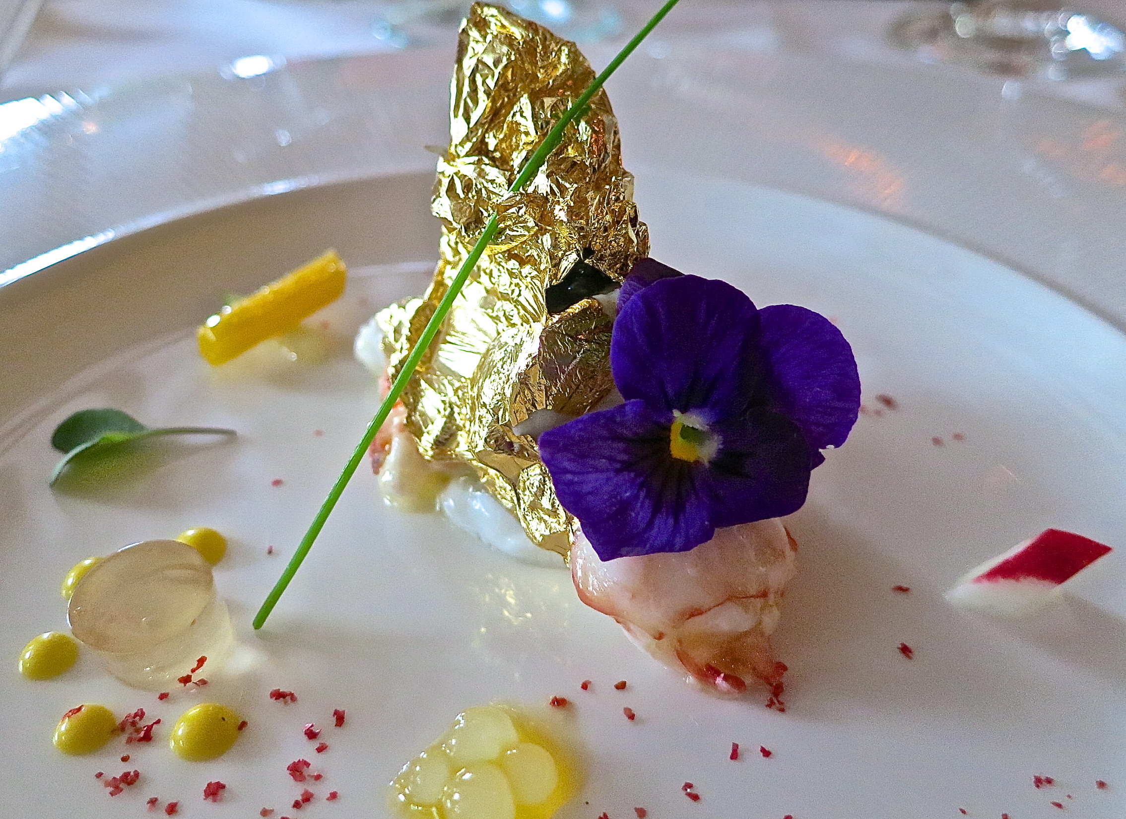 Marinated Langoustine, 24 ct. Gold Covered Osetra Caviar, Passion Fruit  Tapioca, And Vodka Gelee