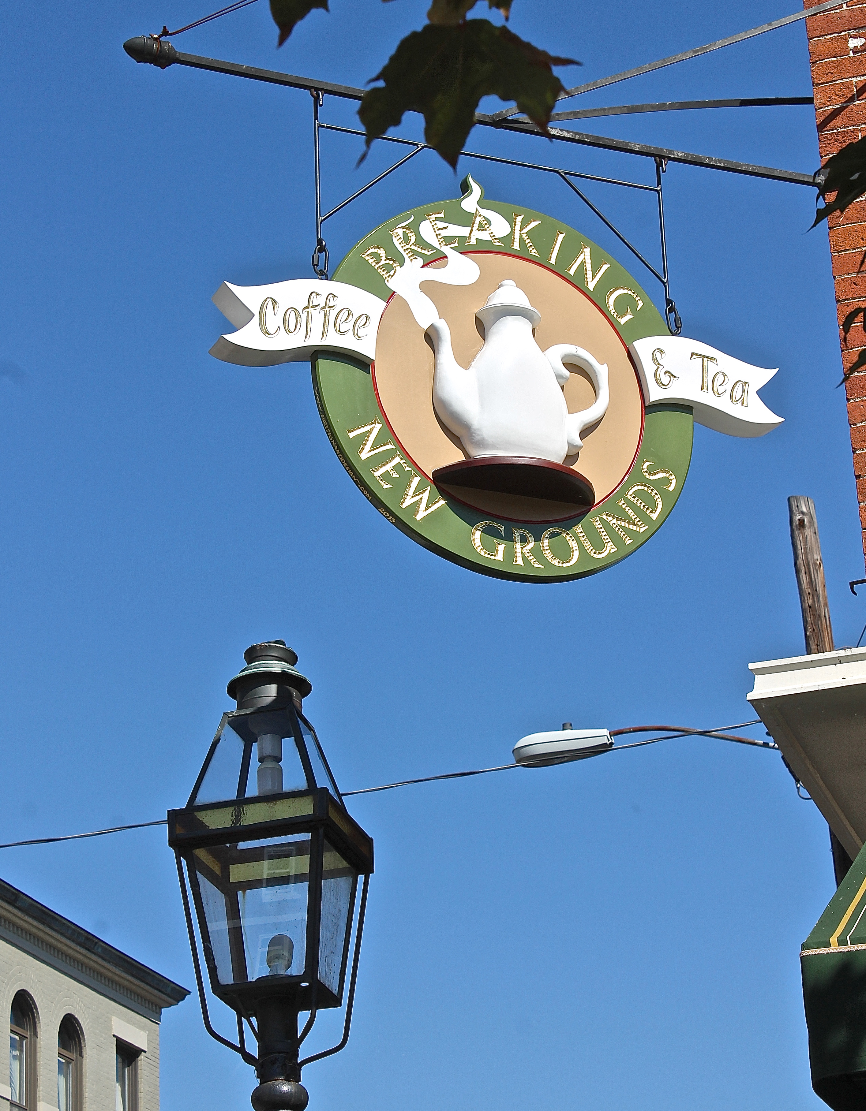 Breaking New Grounds' Sign At Market Square