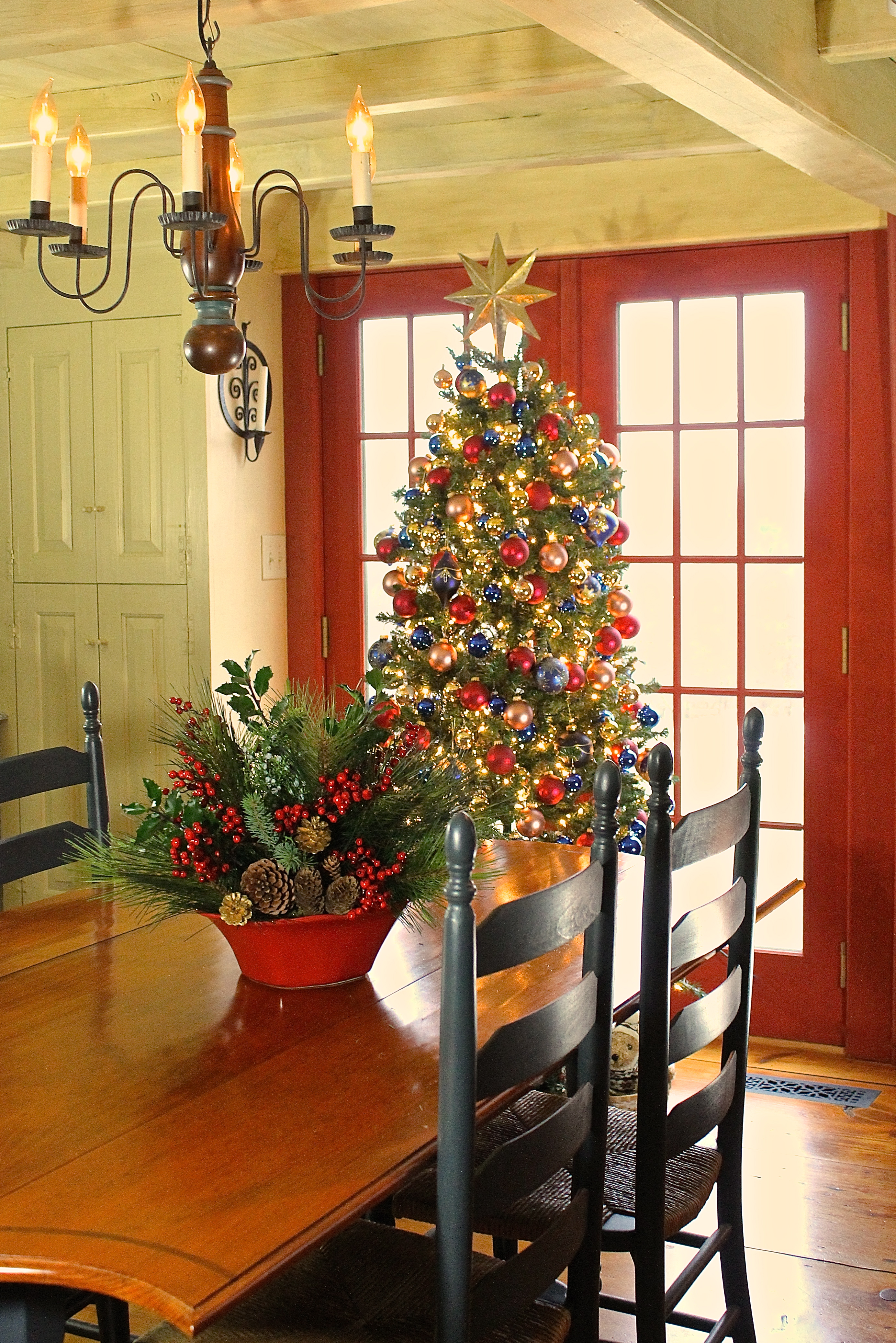 This Year's Christmas Tree Is Trimmed In Burgundy, Blue And Gold