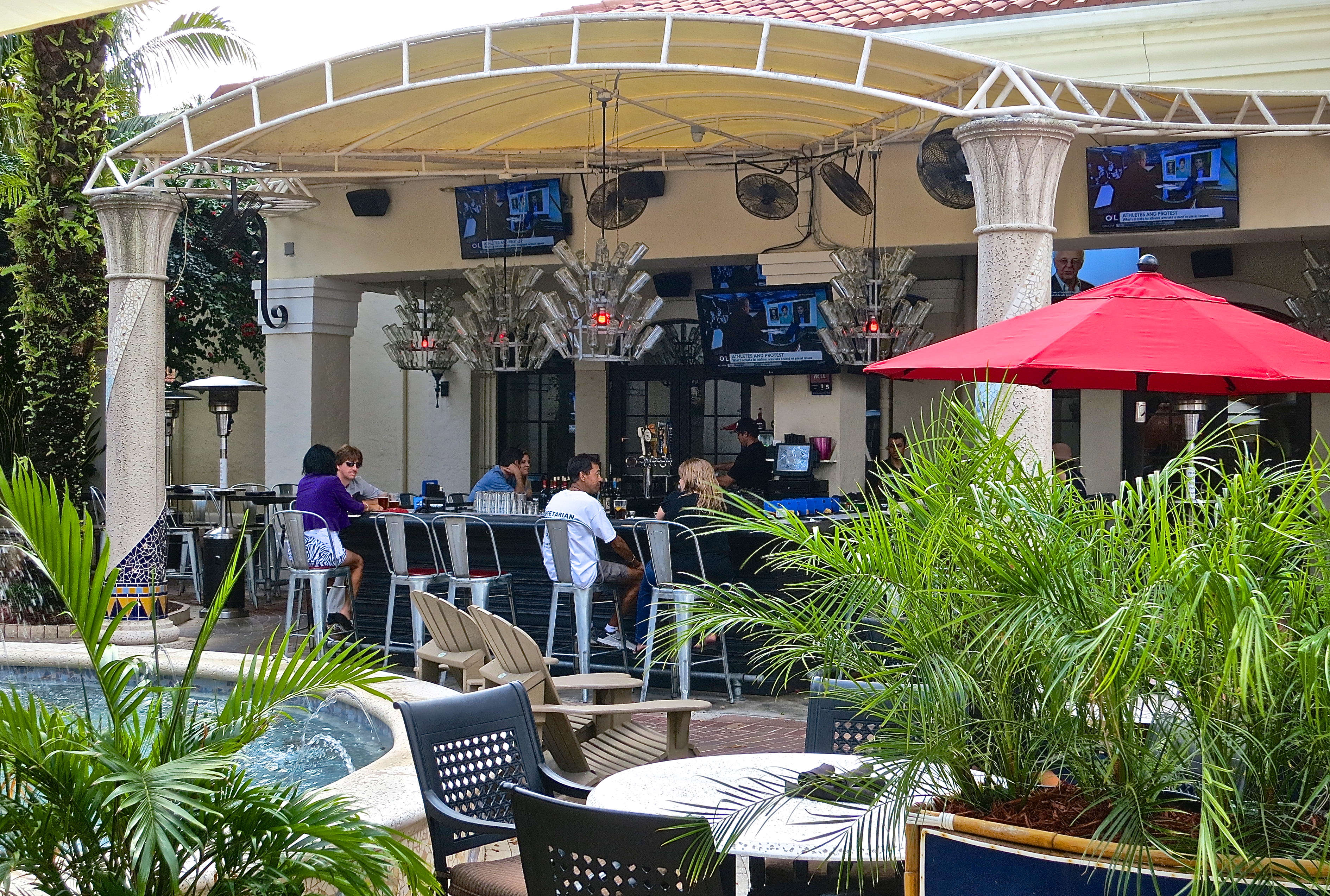 The Outdoor Courtyard And Bar Of The Burger Bar