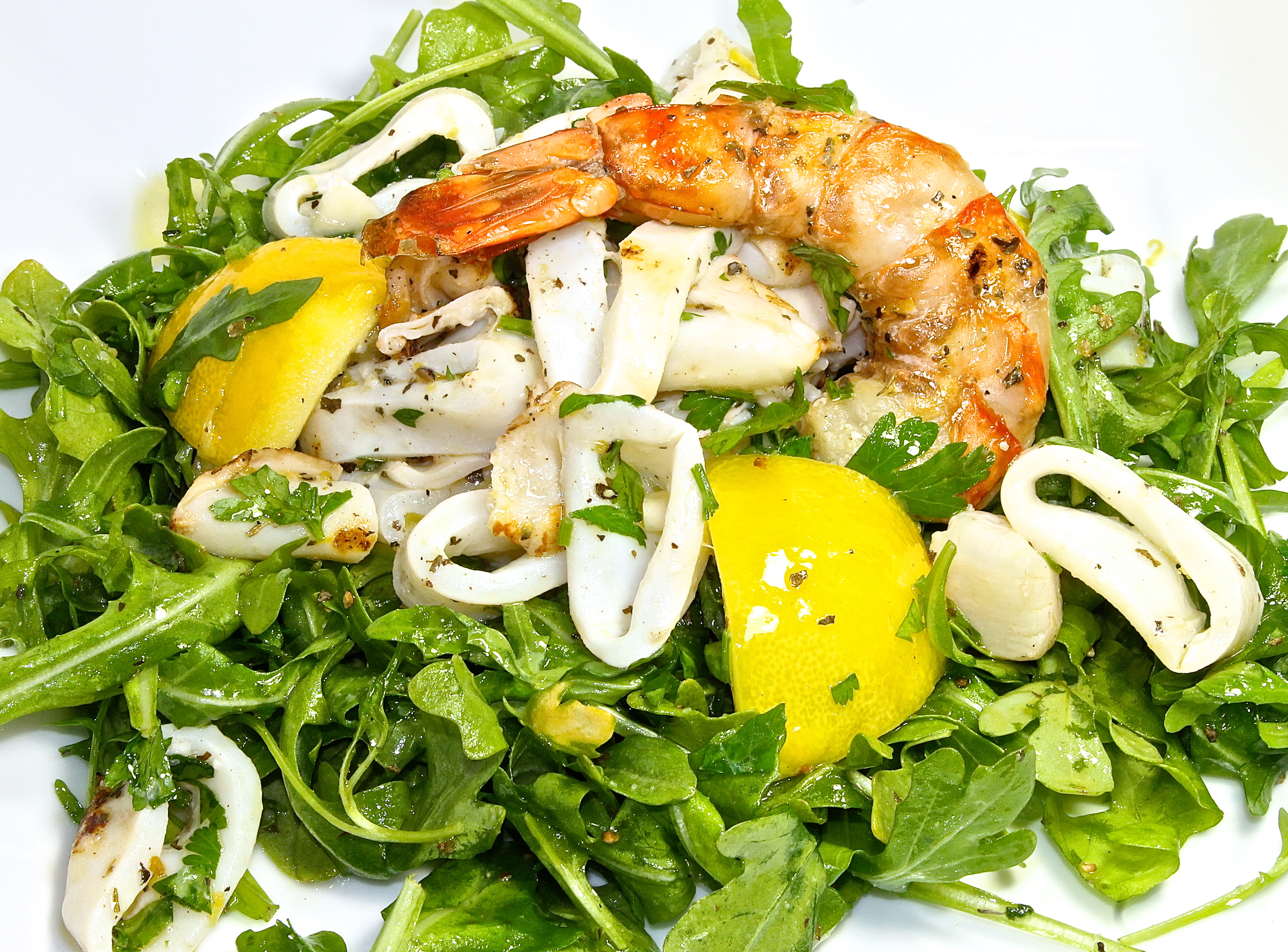 Seafood Salad On A Bed Of Arugula 