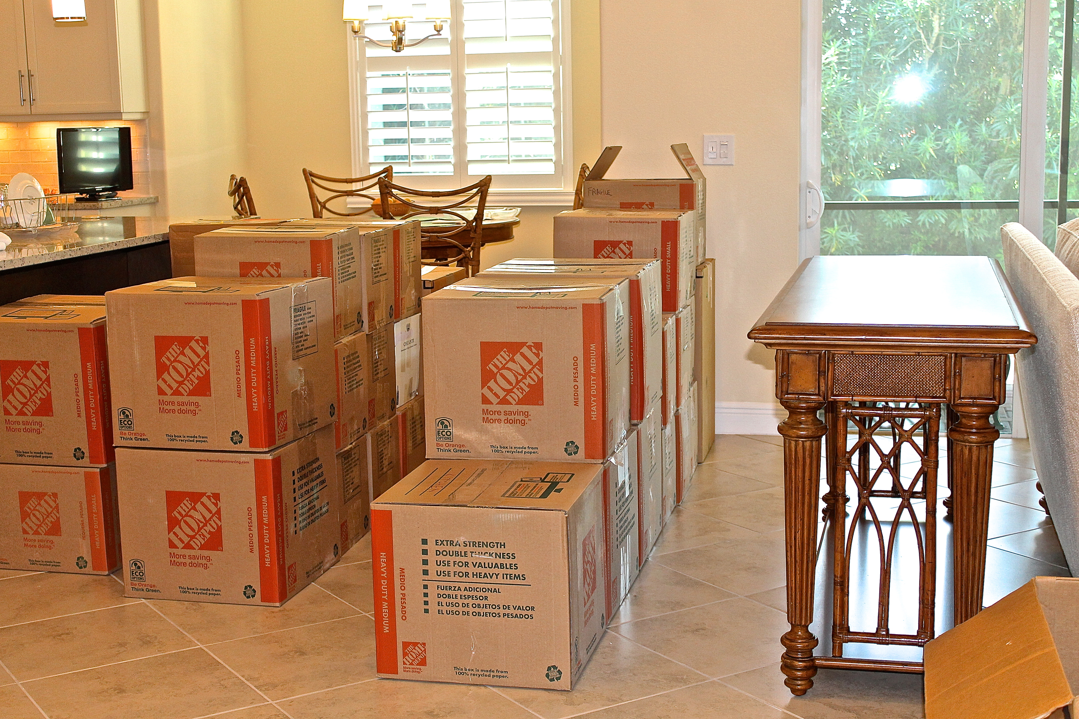 Moving Boxes For The Kitchen Waiting To Be Opened