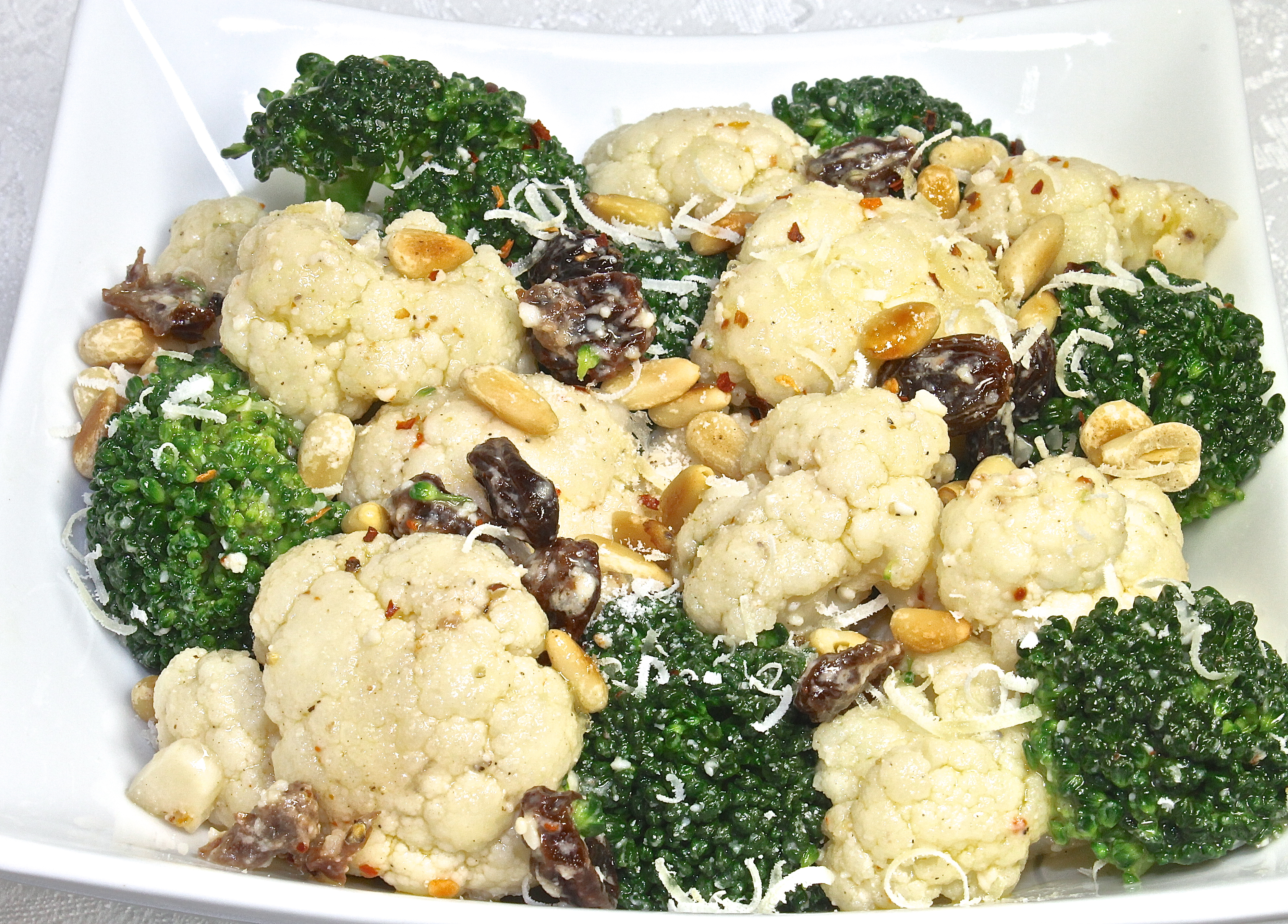 Broccoli And Cauliflower Salad With Smoky Bacon, Pine Nuts And Parmesan Cheese
