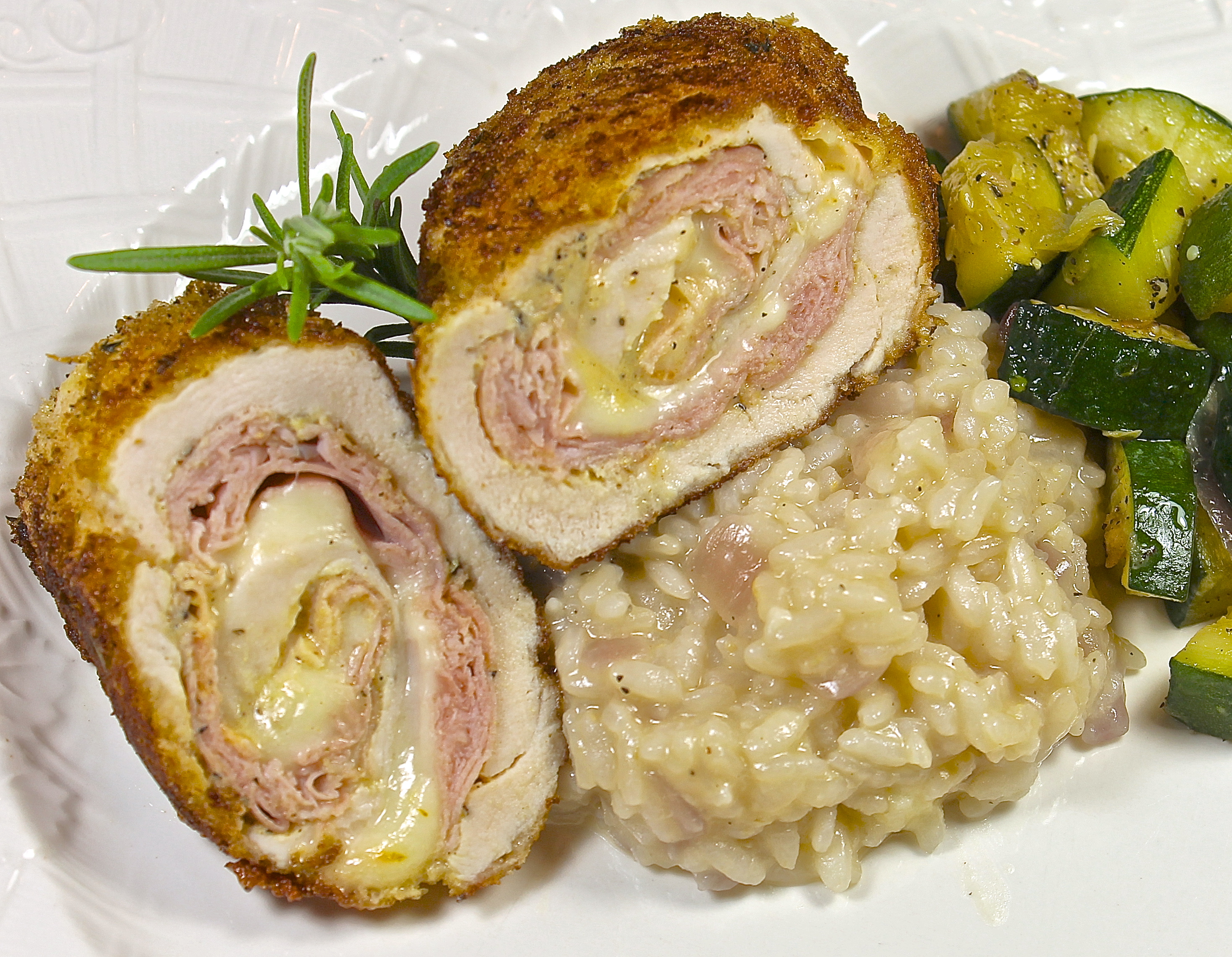 Chicken Cordon Bleu Served With Lemon Risotto And Zucchini