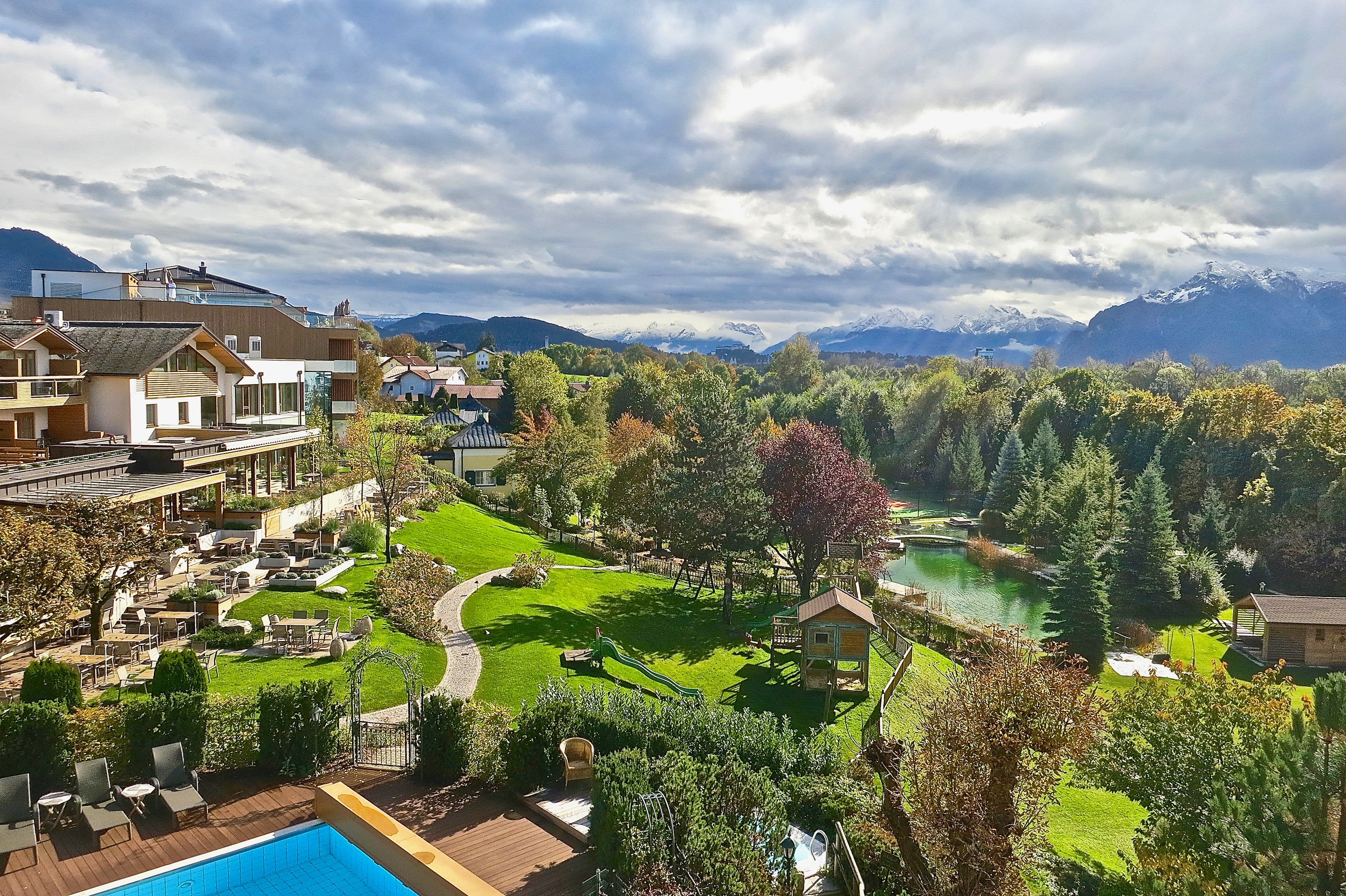 Lush 10,000 square meter landscaped resort gardens at Genussdorf Gmachl in Bergheim Austria 