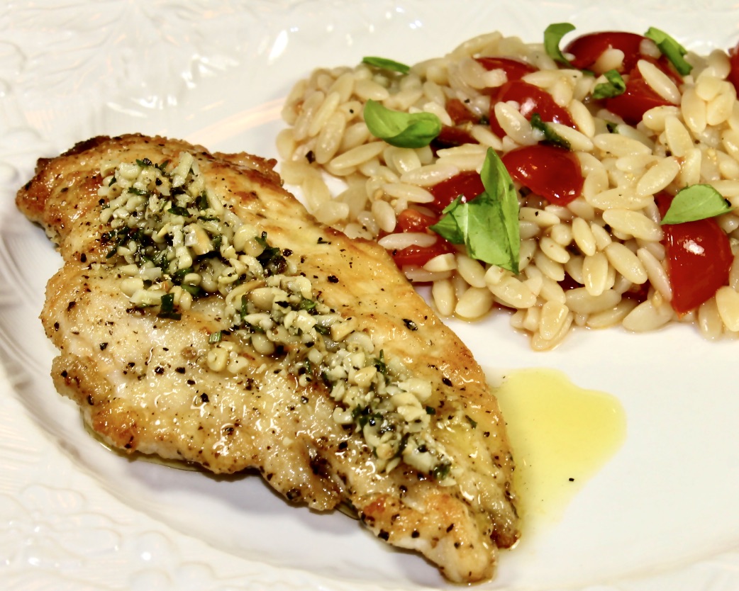 chicken with herb and pine nut sauce