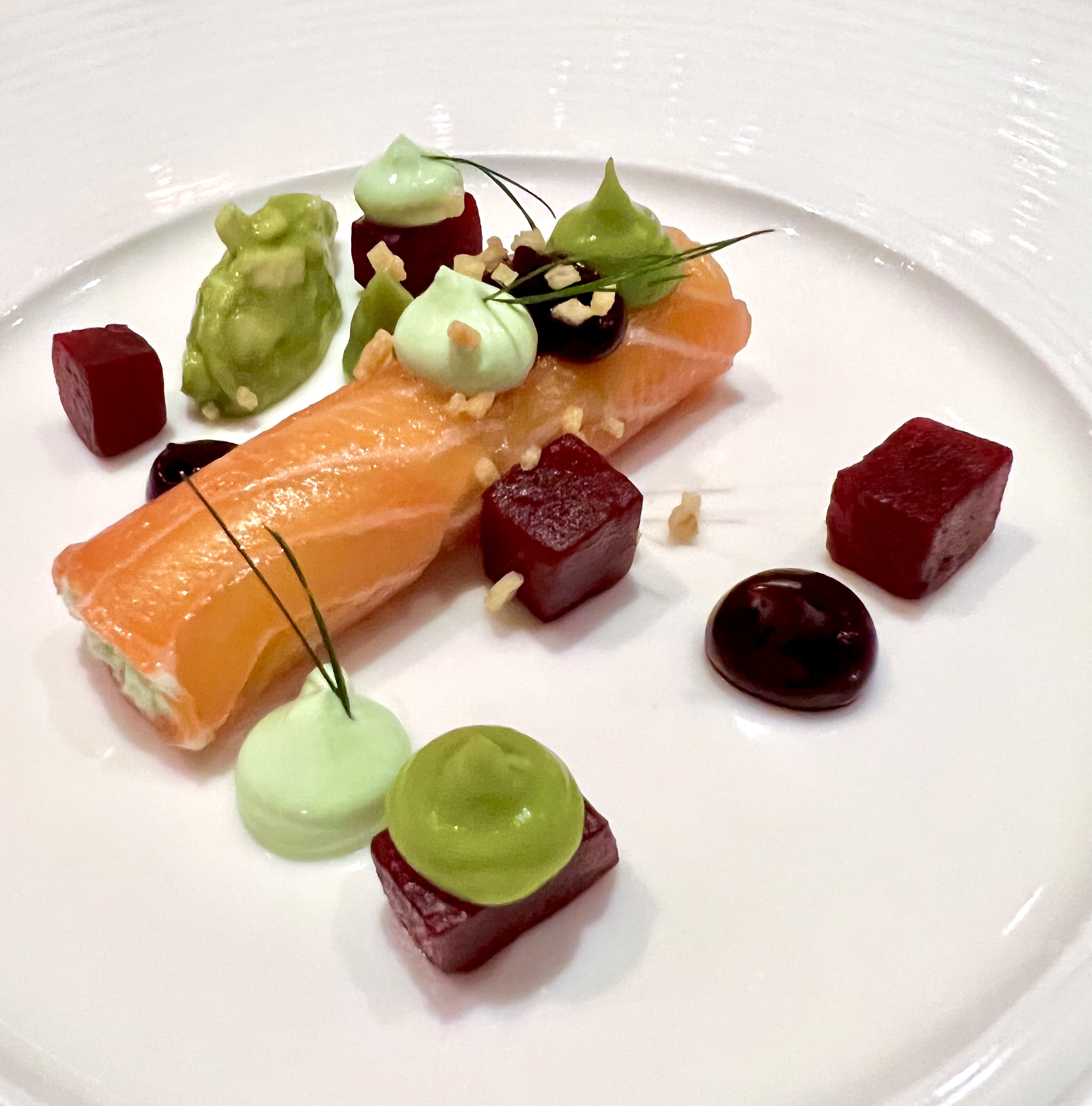 salmon rolls with wasabi, beets and avocado