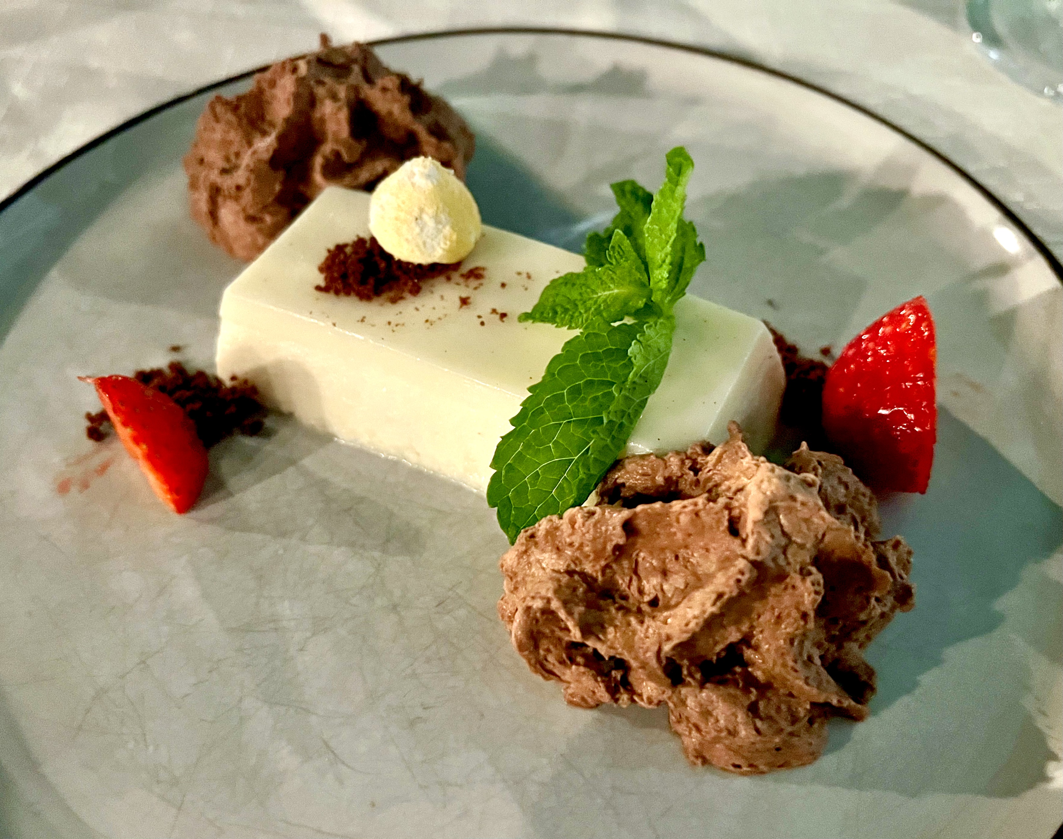 coconut and strawberry crumble with chocolate espuma
