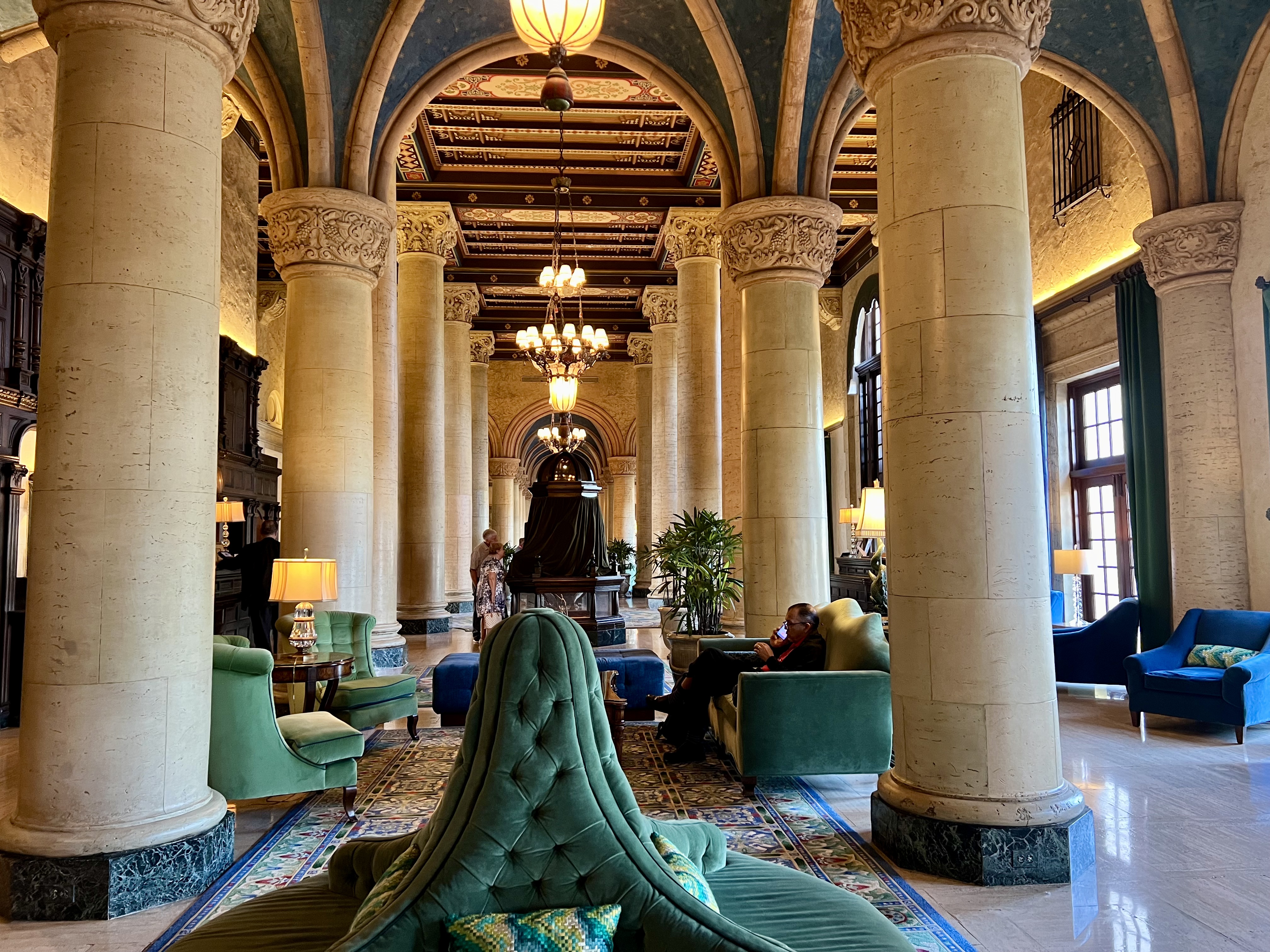 lobby with mahogany and velvet furniture