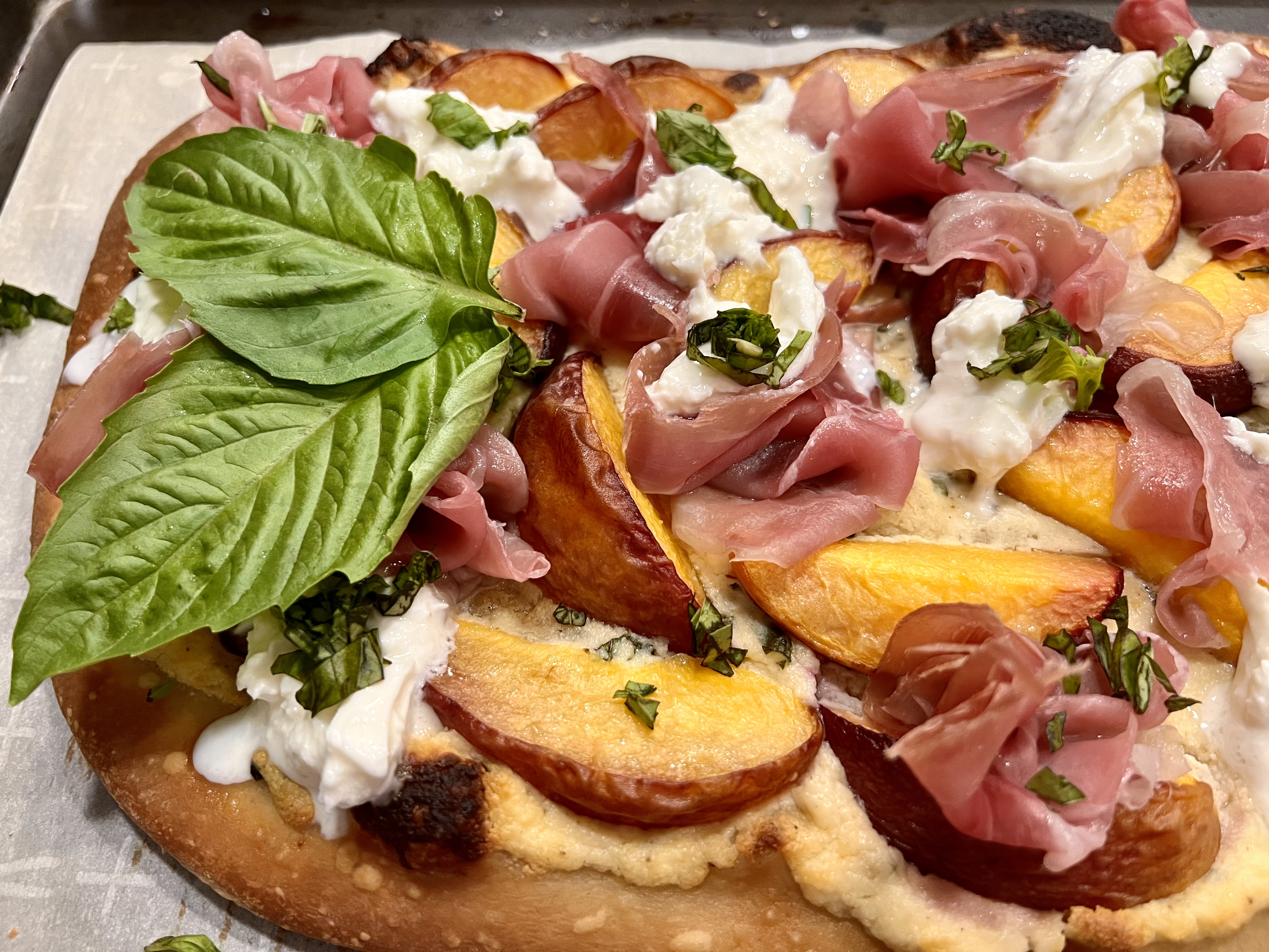 peach prosciutto and buratta pizza