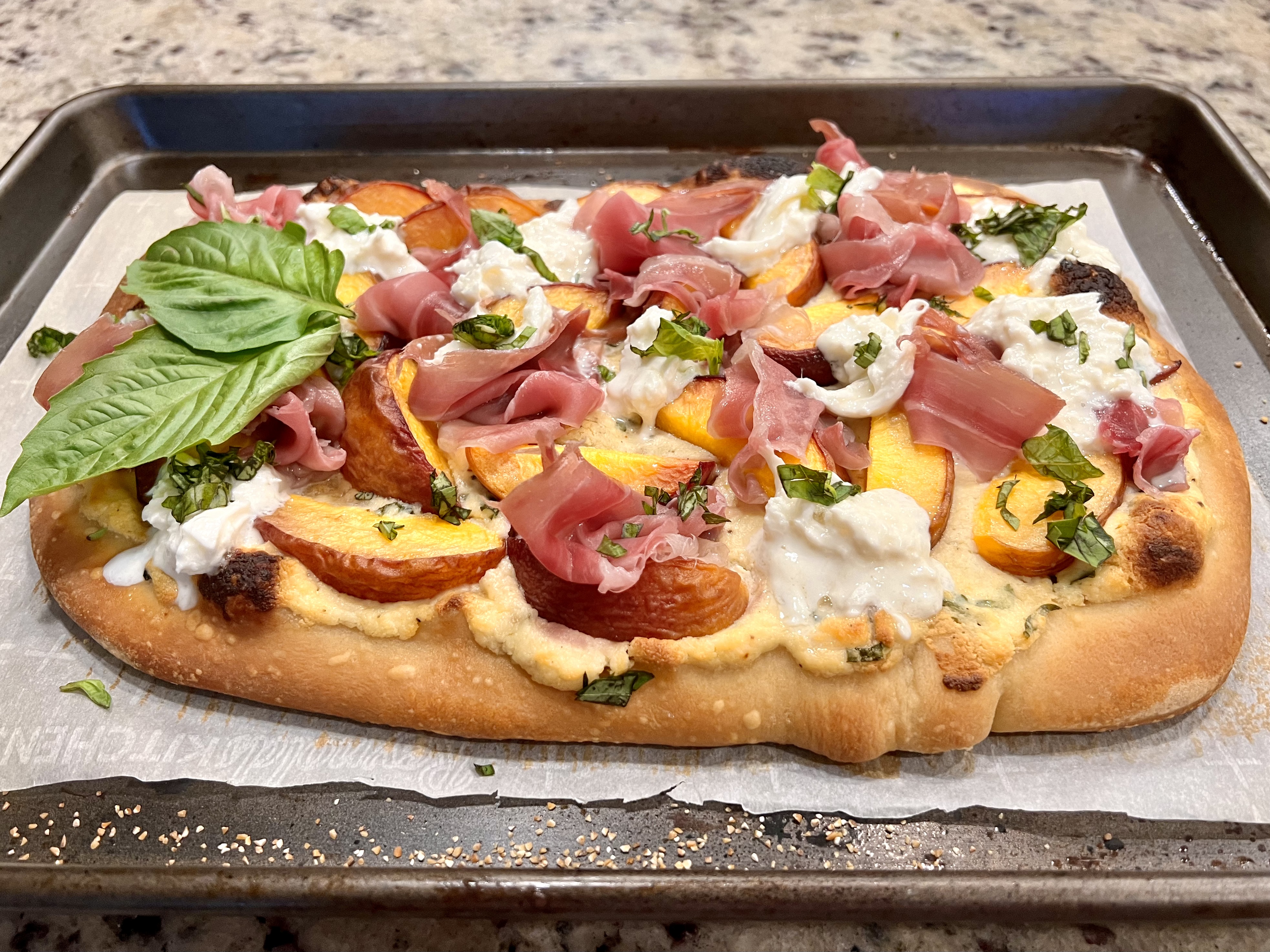 peach prosciutto and buratta pizza
